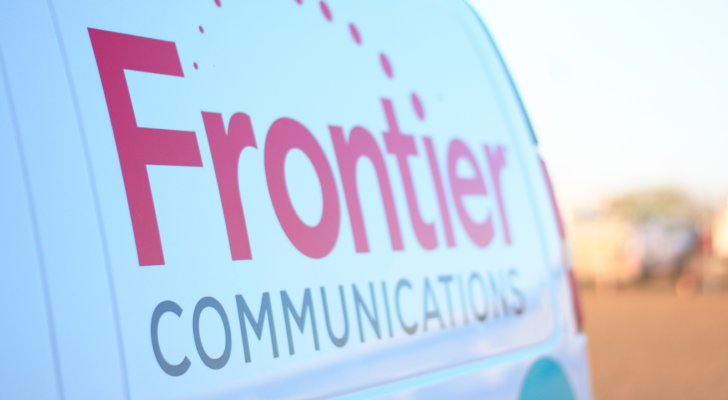 The logo for Frontier Communications (FYBR) is seen in the side of a van.