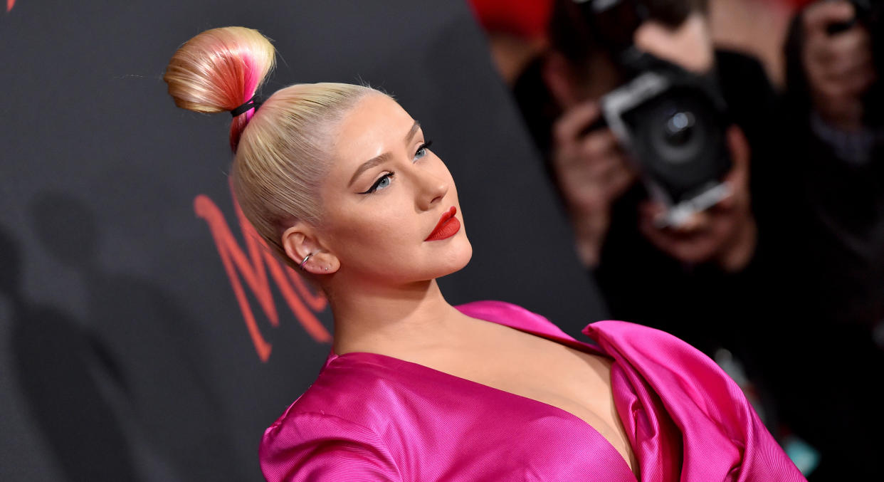 Christina Aguilera has promoted an upcoming festival appearance with a daring pose. (Getty Images)