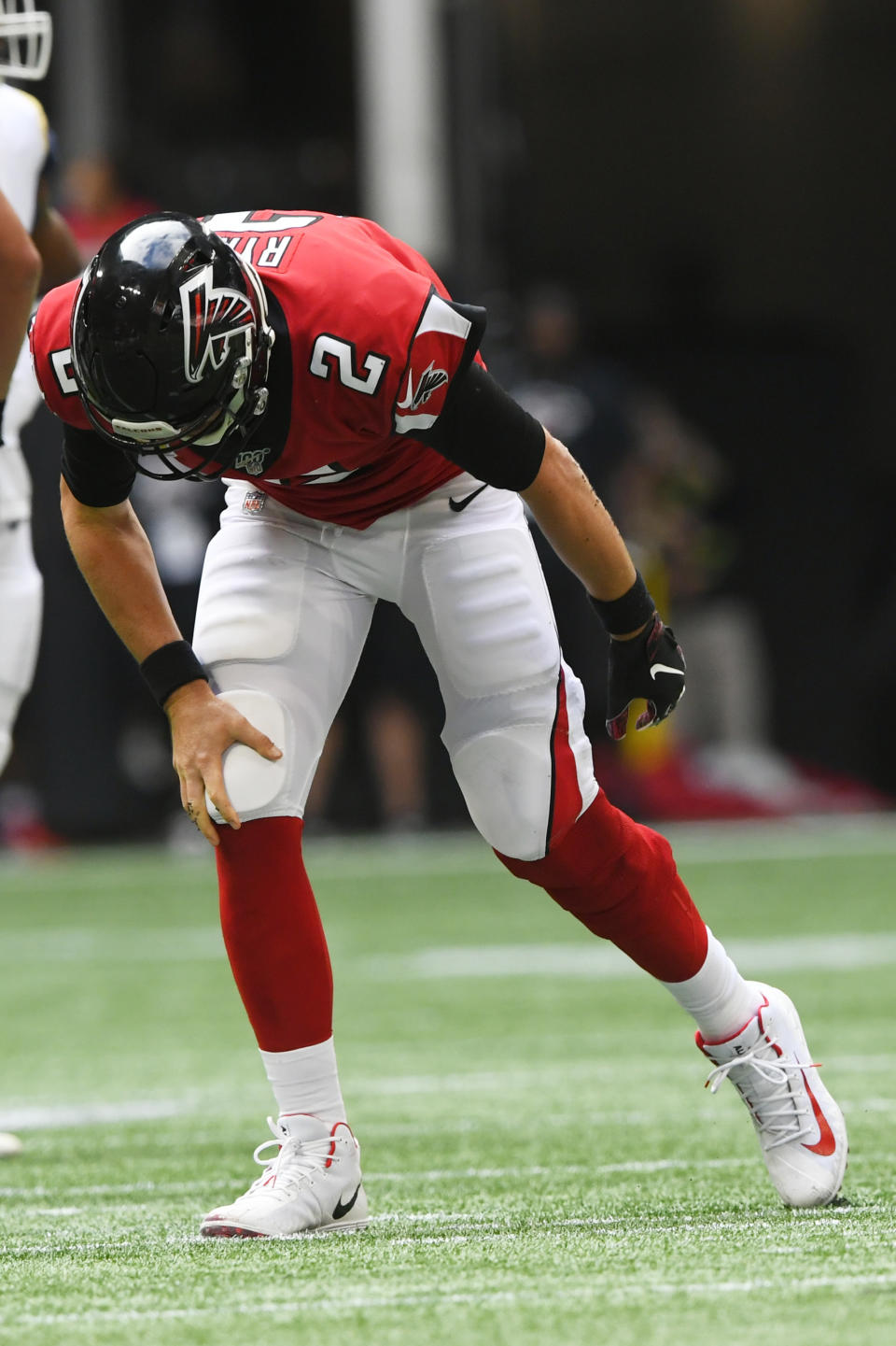 Atlanta Falcons quarterback Matt Ryan (2) stands up from the turf injured against the Los Angeles Rams during the second half of an NFL football game, Sunday, Oct. 20, 2019, in Atlanta. (AP Photo/John Amis)