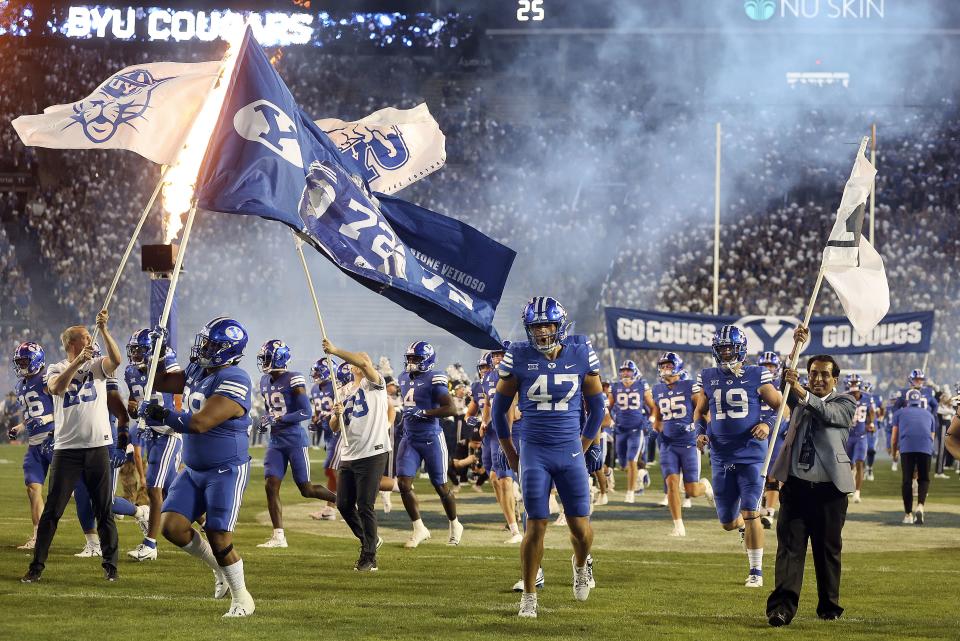 The BYU Cougars enter the field to play the Cincinnati Bearcats at LaVell Edwards Stadium in Provo on Friday, Sept. 29, 2023.