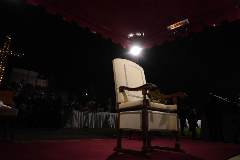 Pope Francis' chair is seen prior to the start of the Via Crucis (Way of the Cross) in front of the Colosseum on Good Friday, in Rome, Friday, March 29, 2024. (AP Photo/Andrew Medichini/Pool)