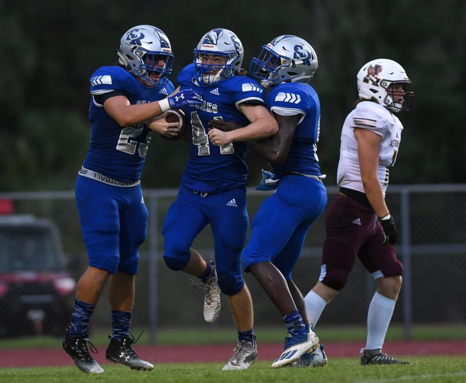 Sebastian’s Michael Howard (44) celebrates a touchdown he made against Astronaut, Friday, Sept. 1, 2023. Sebastian won 44-0.