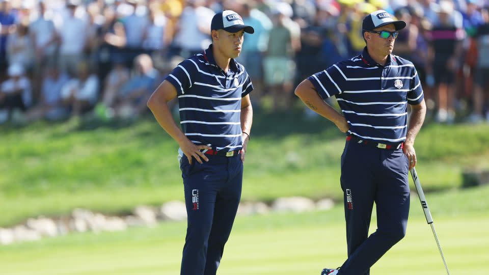Morikawa and Fowler look on during defeat to Lowry and Straka. - Jamie Squire/Getty Images
