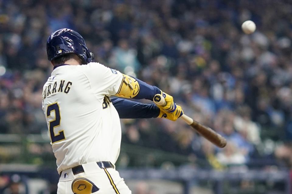 Milwaukee Brewers' Brice Turang hits an RBI single during the third inning of a baseball game against the Minnesota Twins Tuesday, April 2, 2024, in Milwaukee. (AP Photo/Morry Gash)