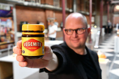 Disgusting Food Museum curator Samuel West shows Australian Vegemite, a sandwich spread made of the leftover yeast at beer breweries, in Malmo, Sweden November 1, 2018. REUTERS/Mikael Nilsson