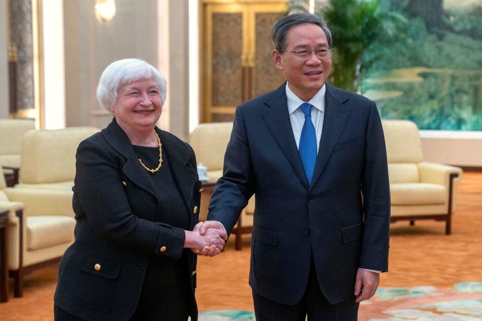 Chinese Premier Li Qiang shakes hands with U.S. Treasury Secretary Janet Yellen during a meeting at the Great Hall of the People in Beijing, China, July 7, 2023. / Credit: MARK SCHIEFELBEIN/POOL/AFP/Getty