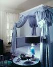 <p>First photographed in 1959, this bedroom, full of 18th-century antiques, feels as fresh today as it did then. A French blue-and-white check fabric—used both on the canopy and the bed covering—creates a light and airy <em>lit à la polonaise</em> bed that serves as the commanding focal point of the space. <br></p>