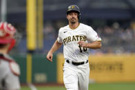 Pittsburgh Pirates' Bryan Reynolds scores on a base hit by Endy Rodriquez against the St. Louis Cardinals in the first inning of a baseball game in Pittsburgh, Monday, Aug. 21, 2023. (AP Photo/Matt Freed)