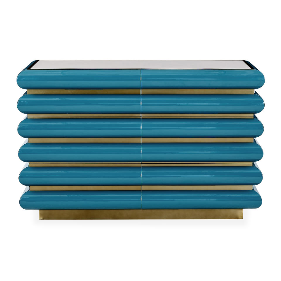 Jonathan Adler’s spring collection includes the Kiki cabinet, which nods to trending Art Deco. (Jonathan Adler via AP)