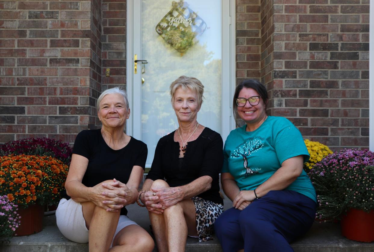 From left, Sober Living president Merrilee Ramsey, vice president Sue Gardner and house leader Hannah Hayes pose for a photo outside of the newly-opened Iowa City Sober Living House on Monday, Oct. 2, 2023. The house will host women in recovery for months at a time.