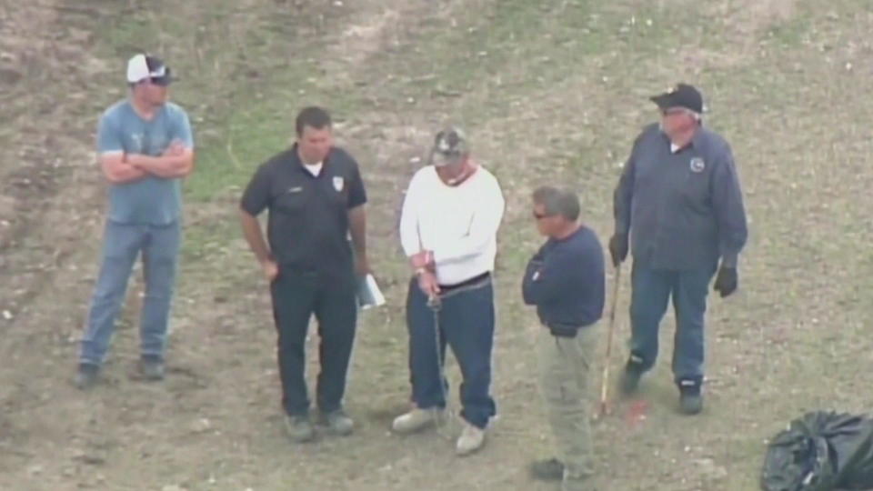 William Reece leads investigators to where he said Kelli Cox's remains were located. / Credit: KTVT