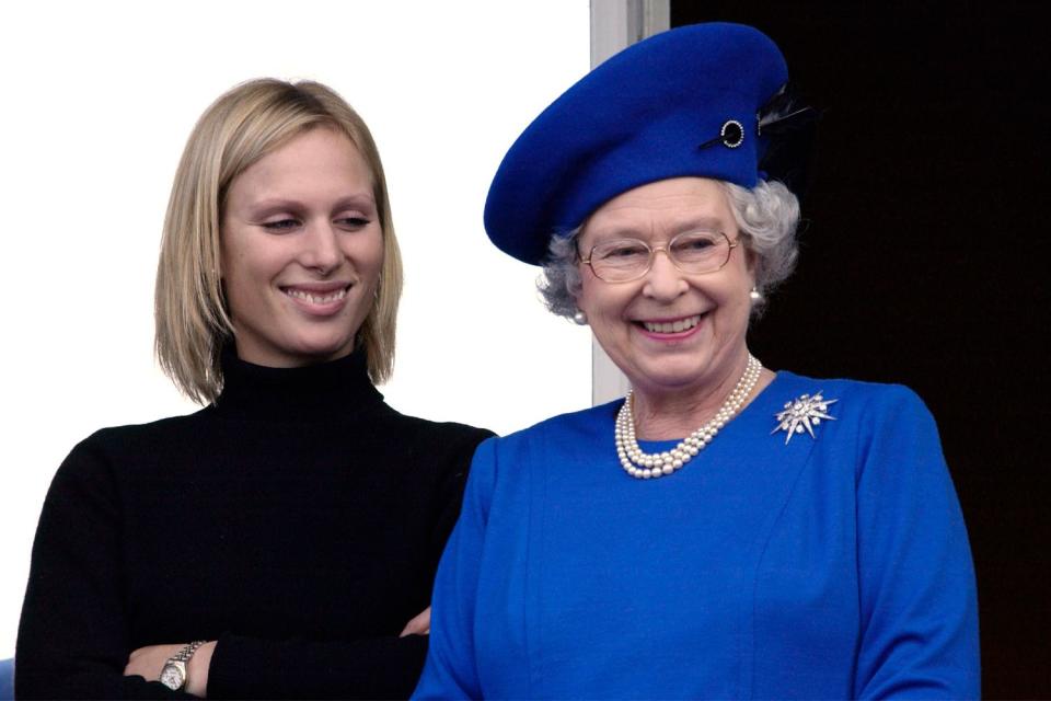 <p>Tim Graham Photo Library via Getty</p> Zara Tindall and Queen Elizabeth at Cheltenham Races National Hunt Festival in 2003.