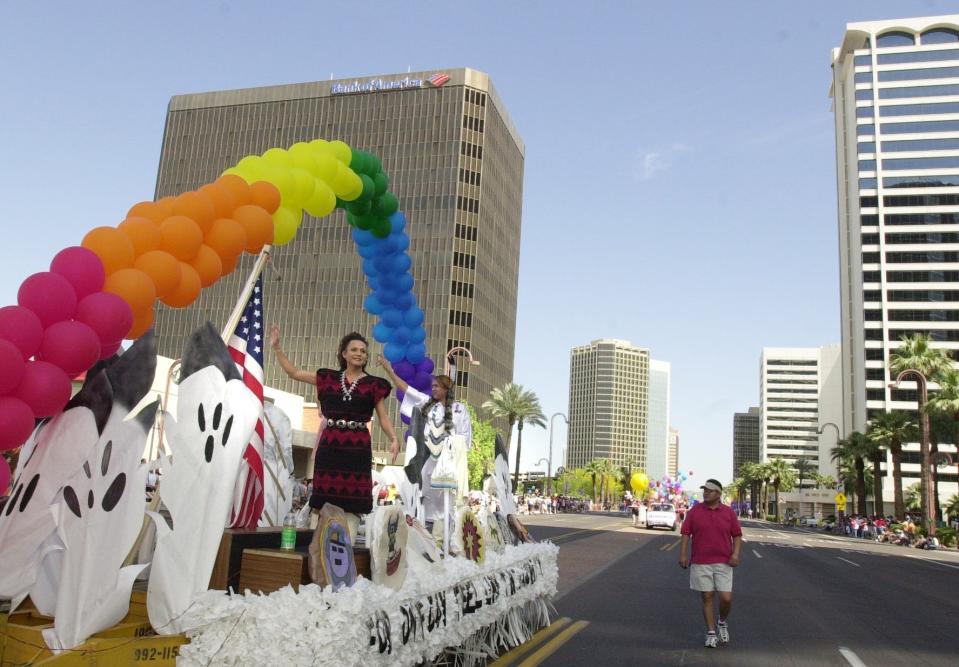 DIGITAL -- A Native American Community Housing float cruises down Central Avenue in the gay pride parade on April 13, 2002. Arizona Central Pride parade Photo by Cheryl Evans 04/13/02