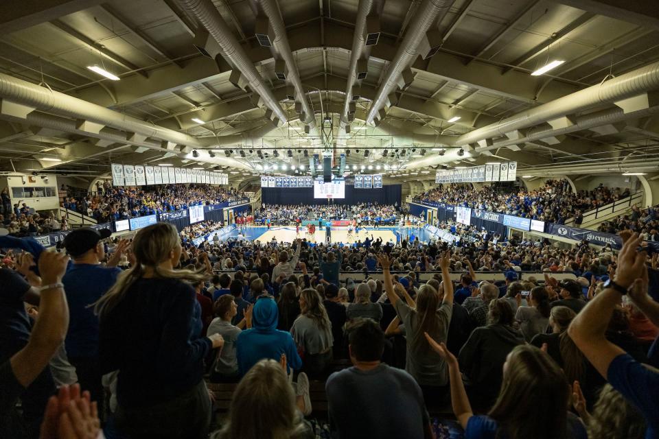 Fans cheer at the Smith Fieldhouse in Provo during BYU-Kansas women’s volleyball match on Nov. 20, 2023. | Abby Shelton, BYU Photo