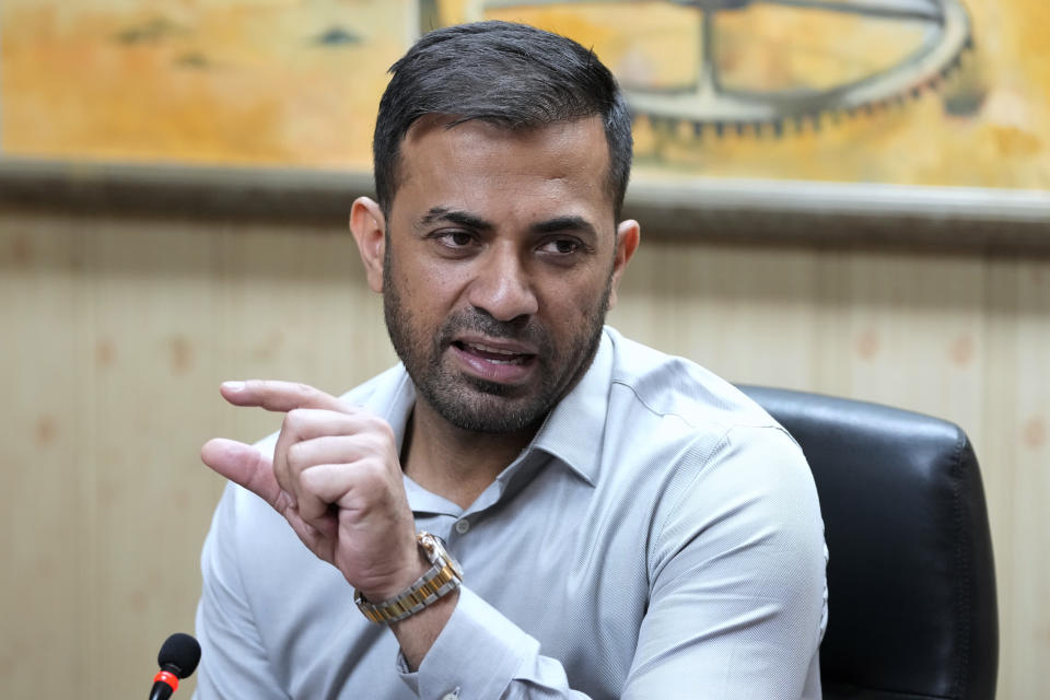 Pakistan fast bowler Wahab Riaz speaks during a press conference, in Lahore, Pakistan, Wednesday, Aug. 16, 2023. Riaz retired from international cricket on Wednesday but will continue to play franchise cricket. (AP Photo/K.M. Chaudary)