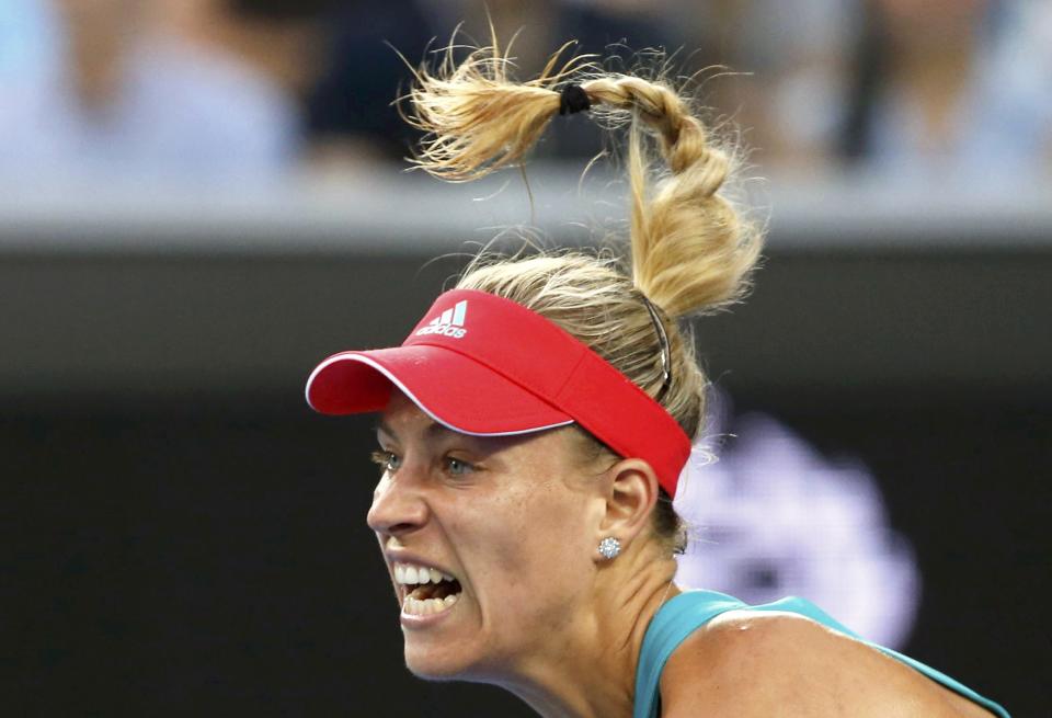 Germany's Angelique Kerber serves during her second round match against Romania's Alexandra Dulgheru at the Australian Open tennis tournament at Melbourne Park, Australia, January 21, 2016. REUTERS/Jason Reed