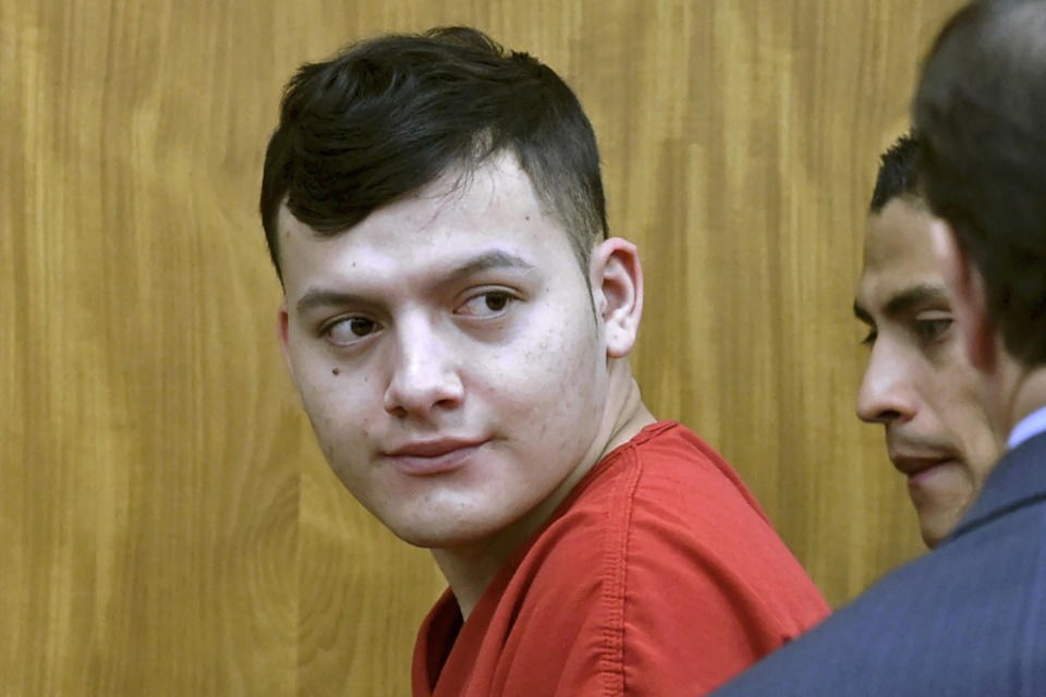 FILE - In this May 20, 2019, file photo, Wilber Ernesto Martinez-Guzman, from El Salvador, appears in Washoe District Court in Reno, Nev. The 22-year-old Salvadoran immigrant who was facing two death penalty trials in the killings of four people in northern Nevada will plead guilty Thursday, Oct. 21, 2021, in an agreement that will put him in prison for the rest of his life, a prosecutor said. (Andy Barron/The Reno Gazette-Journal via AP, Pool, File)