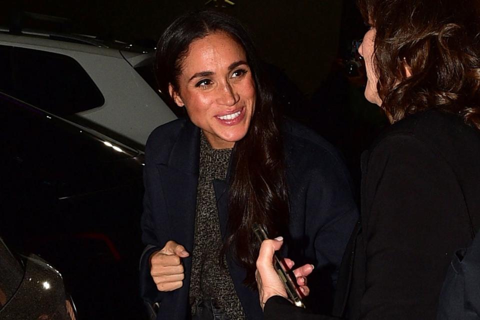 <p>MEGA</p> Meghan Markle steps out for dinner with a friend in Los Angeles on Feb. 22, 2024