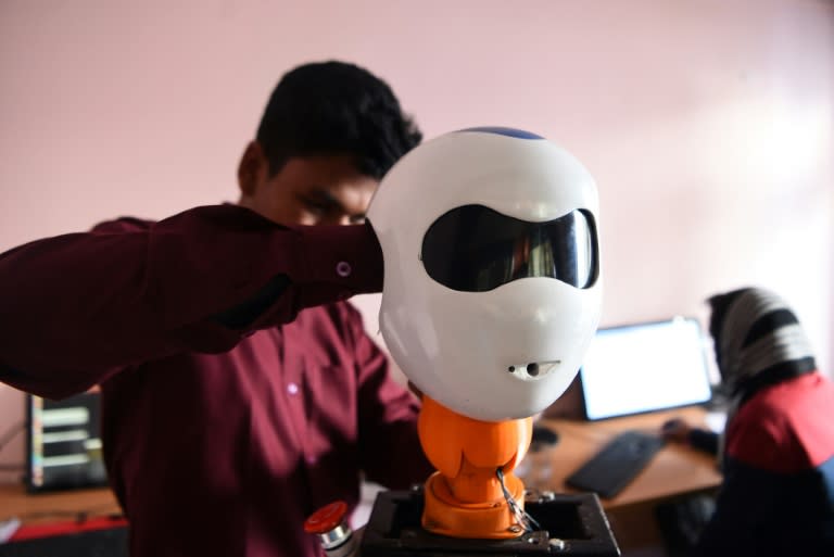 The team of 25 young engineers worked for months to build the robot, welding and moulding the prototype by hand in their tiny three-roomed office
