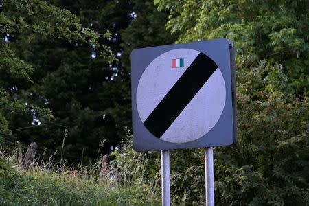 A road sign is seen bearing a sticker with the Irish tricolour, near Caledon in Northern Ireland June 28, 2016. REUTERS/Clodagh Kilcoyne