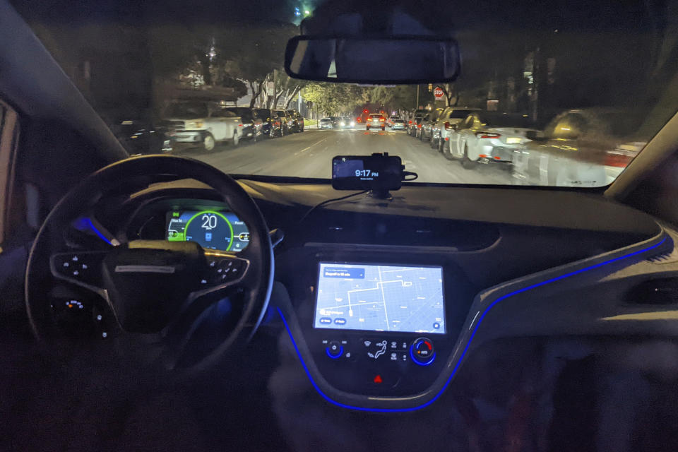 FILE - The empty driver's seat is shown in a driverless Chevy Bolt car named Peaches carrying Associated Press reporter Michael Liedtke during a ride in San Francisco, Sept. 13, 2022. The experience provided a snapshot of the often mysterious ways robotaxis have been malfunctioning in San Francisco, triggering a local backlash as state regulators prepare to vote on a proposed citywide expansion of the driverless vehicles on Thursday, Aug. 10, 2023. (AP Photo/Michael Liedtke, File)