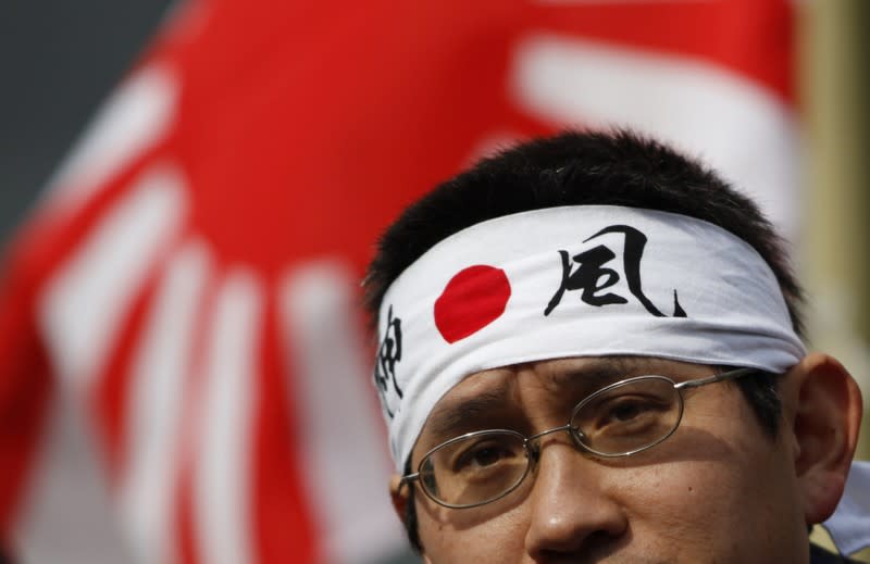 A protester takes part in an anti-South Korea rally near South Korean embassy in Tokyo