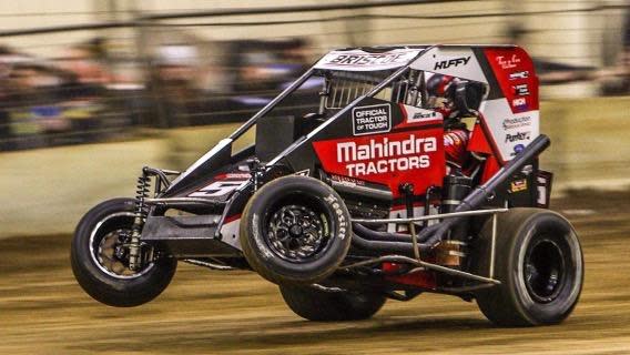 Mitchell's Chase Briscoe gets his No.5 Mahindra Tractors Midget car up on two wheels during the Jason Leffler Memorial it DuQuoin, Il., last fall.