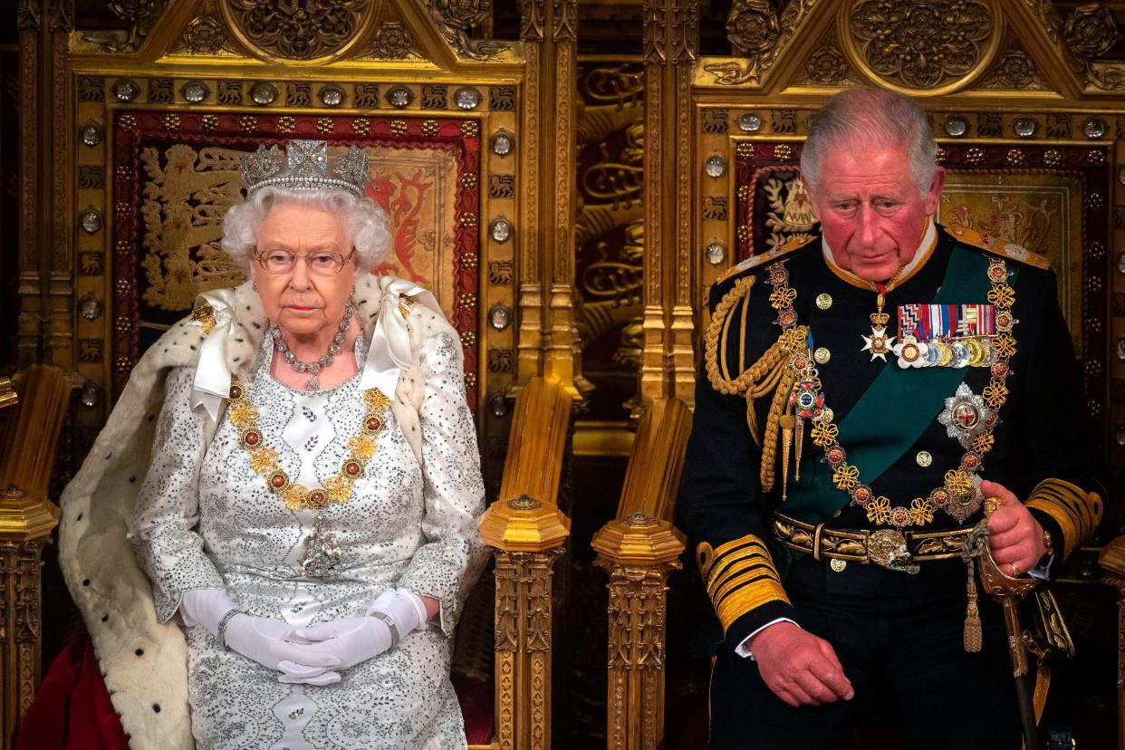 Queen Elizabeth II with Prince Charles, Prince of Wales on the Sovereign's throne to deliver the Queen's Speech at the State Opening of Parliament in in London on Oct. 14, 2019.