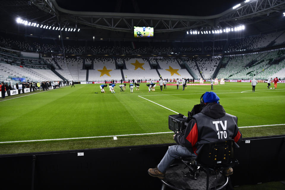 A view of the empty Juventus stadium, as a measure against coronavirus contagion, prior to the Serie A soccer match between Juventus and Inter, in Turin, Italy, Sunday, March 8, 2020. Serie A played on Sunday despite calls from Italy’s sports minister and players’ association president to suspend the games in Italy’s top soccer division. (Marco Alpozzi/LaPresse via AP)
