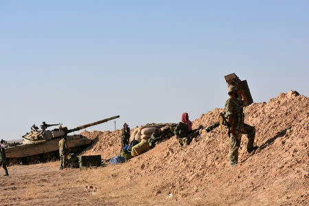 Forces loyal to Syria's President Bashar al-Assad are seen in Deir al Zor, Syria in this handout picture provided by SANA on September 10, 2017, Syria. SANA/Handout via REUTERS