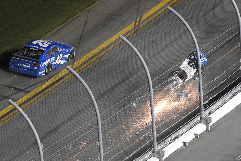 Ryan Newman (6) slides in front of the grandstands on his roof after crossing the finish line during the NASCAR Daytona 500 auto race at Daytona International Speedway, Monday, Feb. 17, 2020, in Daytona Beach, Fla. (AP Photo/Phelan M. Ebenhack)