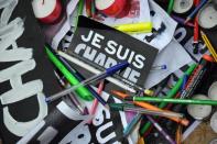 Pens and signs reading 'I am Charlie'' in La Rochelle during a gathering to pay tribute to the victims of the Paris shootings