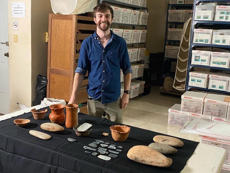 Millsaps College professor Evan Parker with some of his early Maya offerings, including jade and pottery, dated to 900-700 BC, highlighted in the new Nat Geo series The Rise and Fall of the Maya.