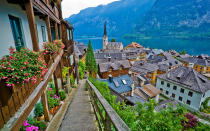 <p>The storybook town of Hallstatt in central Austria enjoys a gorgeous setting on the bank of the Hallst?tter See, between the pristine lake and a lush mountain that rises dramatically from the water's edge. A history of salt mining dating back thousands of years has translated into enduring prosperity for the town, which is most evident in the beautiful square ringed with ivy-covered buildings.</p>