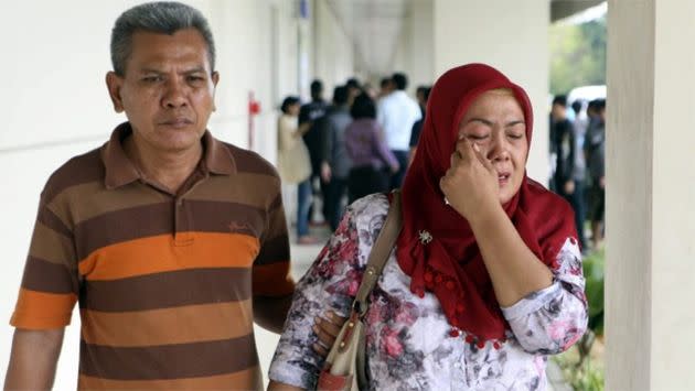 Relatives of QZ8501 passengers anxiously await more information as the search continues for the aircraft. Photo: AP