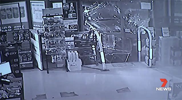 The thieves used a 4WD Ford Ranger to smash their way into a Victorian liquor store. Picture: 7 News