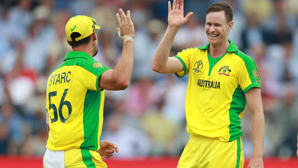 Jason Behrendorff and Mitchell Starc celebrate. (Photo by David Rogers/Getty Images)