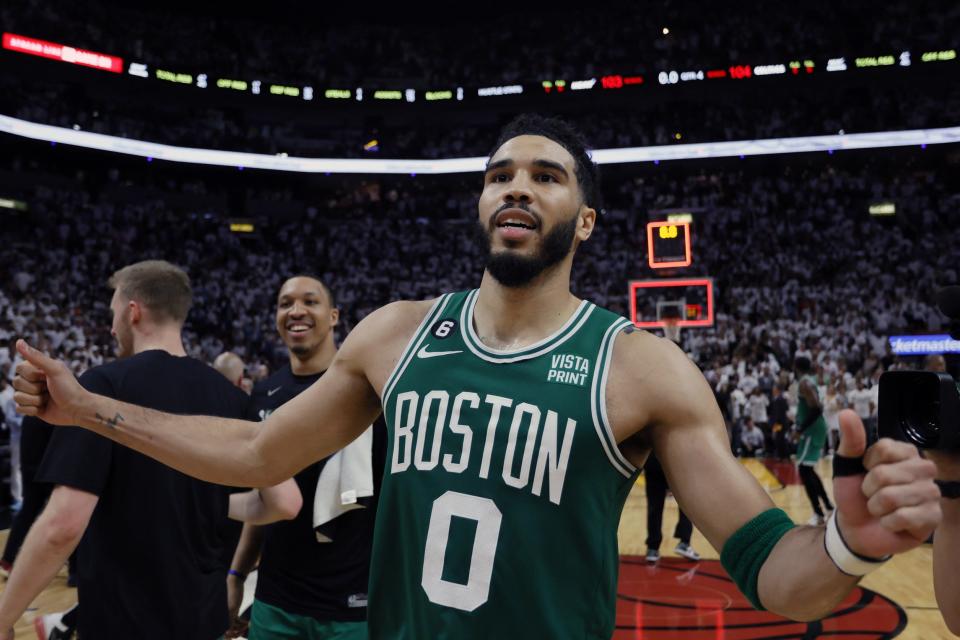 May 27, 2023; Miami, Florida, USA; Boston Celtics forward Jayson Tatum (0) celebrates after defeating the Miami Heat in game six of the Eastern Conference Finals for the 2023 NBA playoffs at Kaseya Center. Mandatory Credit: Sam Navarro-USA TODAY Sports