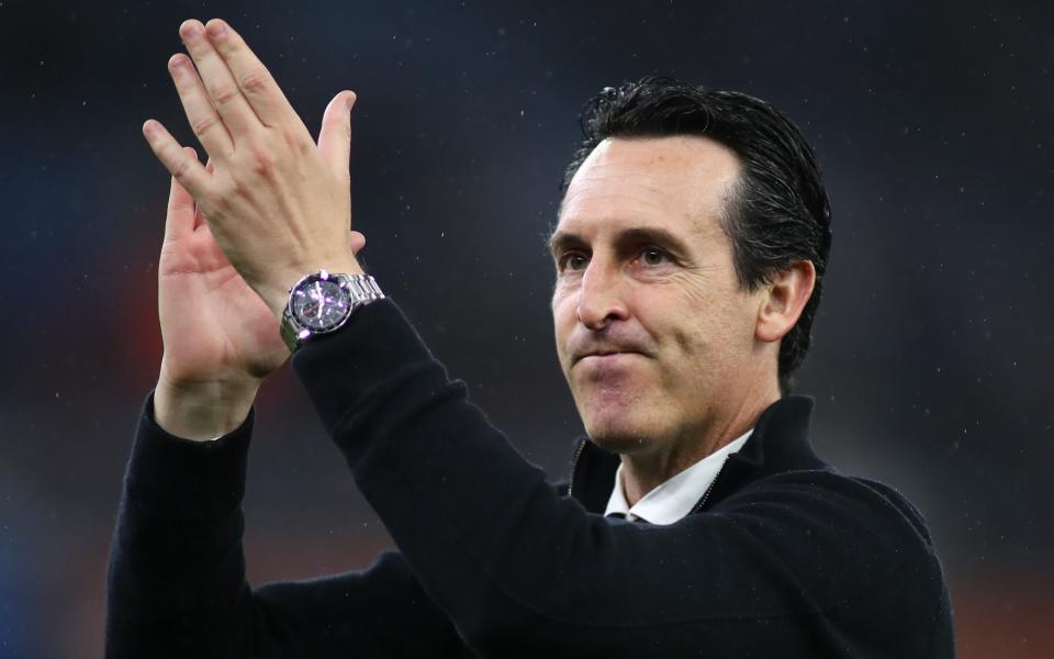 Aston Villa manager Unai Emery applauds the fans