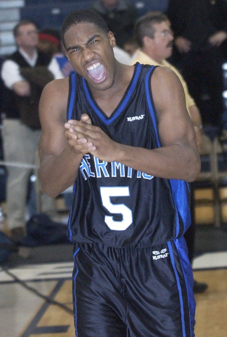 St. Augustine's Anthony Farmer celebrates after winning the Non-Public A state championship in 2004.