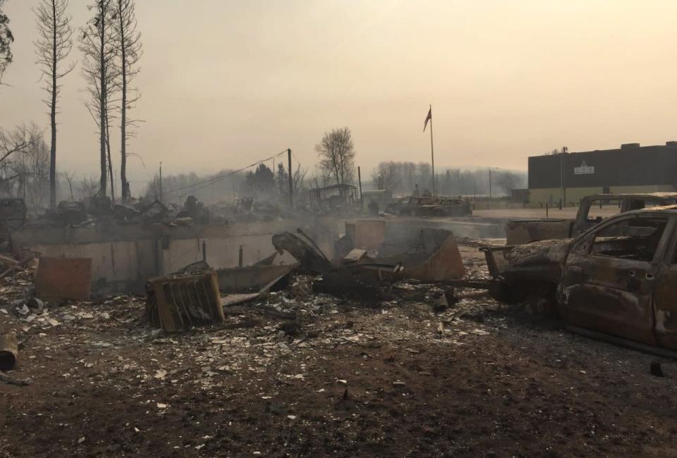 The home of Alberta Wildrose Party Leader Brian Jean is shown burned to the ground in Fort McMurray, Alta., Wednesday, May 4, 2016. THE CANADIAN PRESS/Brian Jean