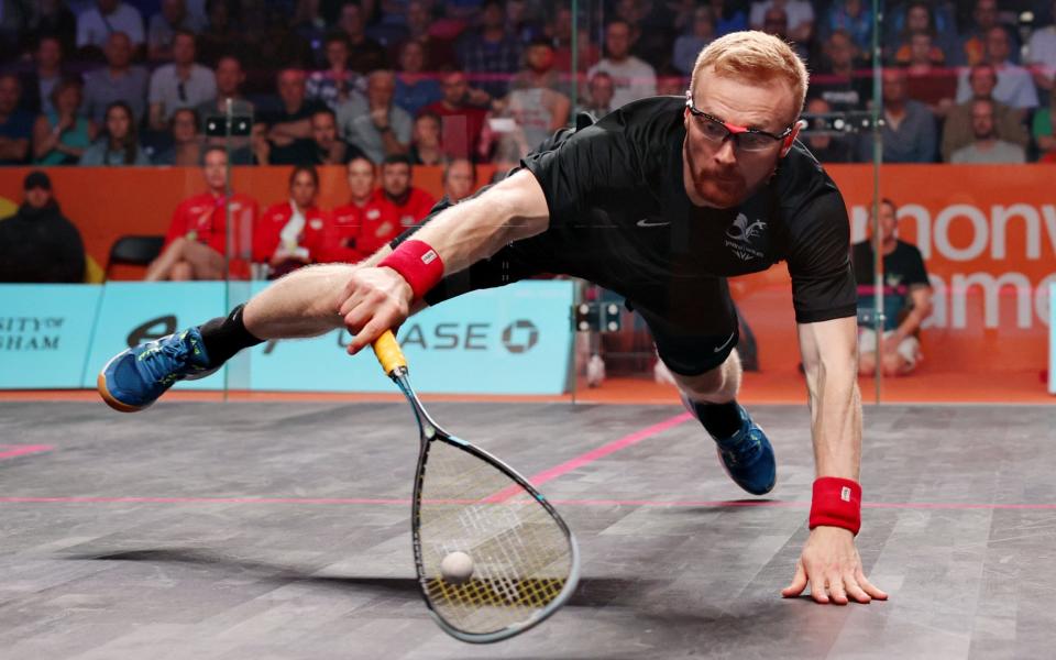 Joel Makin of Team Wales in the squash mixed doubles quarter-final against England - Eddie Keogh/Getty Images