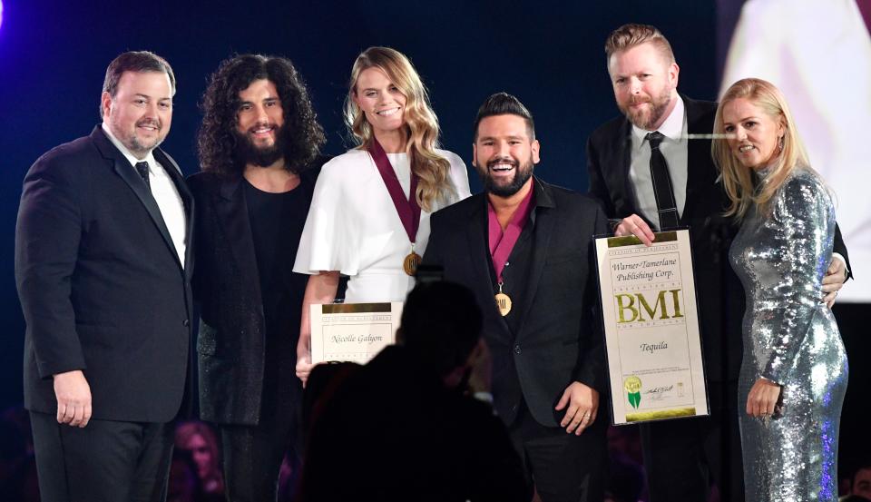 Nicolle Galyon and Dan + Shay are honored for their song, “Tequila,” at BMI’s 67th Annual Country Awards  Tuesday, Nov. 12, 2019, in Nashville, Tenn. 