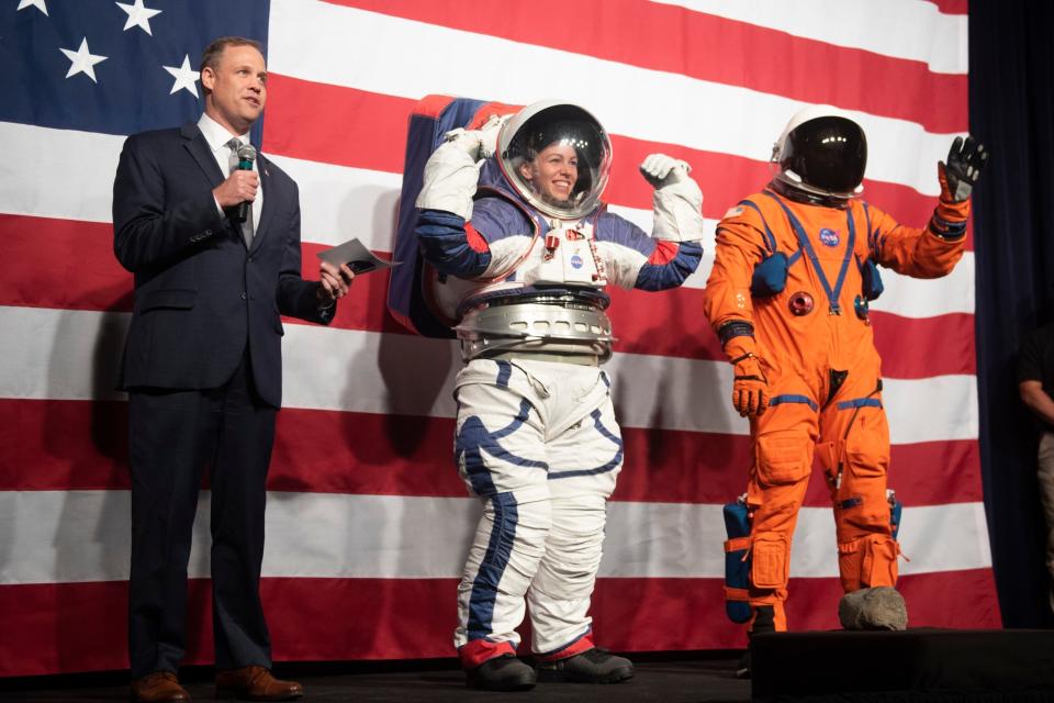 NASA administrator Jim Bridenstine, left, speaks during a demonstration of two NASA spacesuit.(AP)