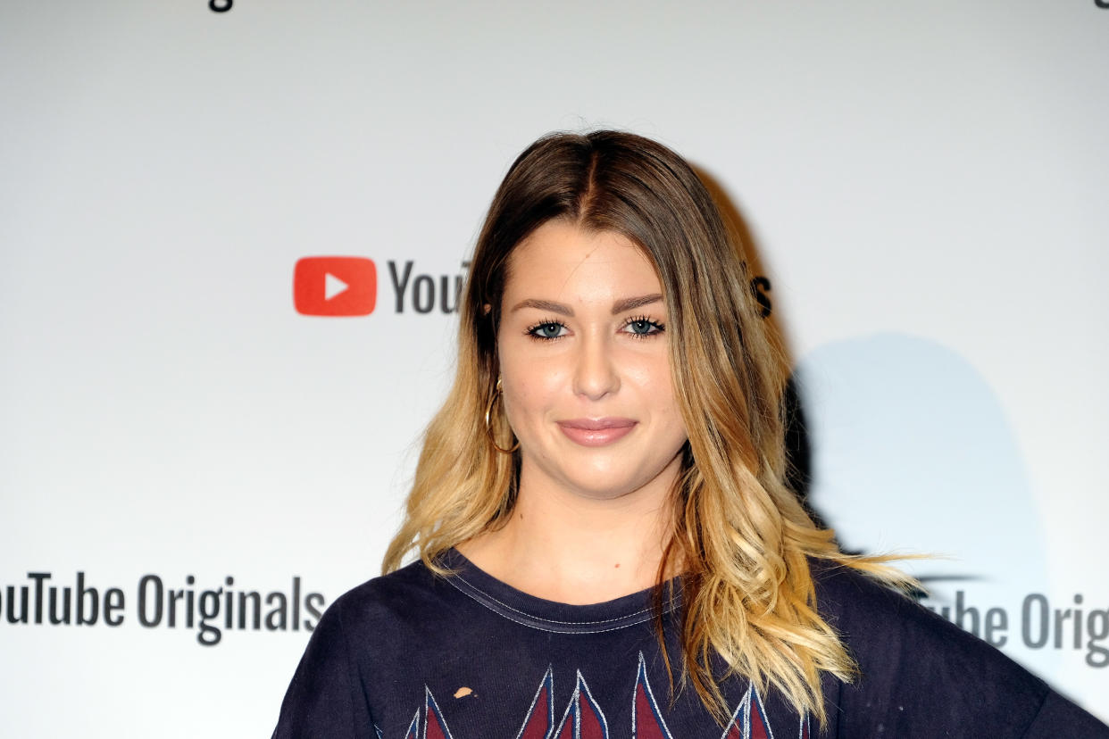 PARIS, FRANCE - SEPTEMBER 18:  Marie Lopez aka Enjoyphoenix attends "Les Emmerdeurs & Groom" Paris Premiere at Le Grand Rex on September 18, 2018 in Paris, France.  (Photo by Laurent Viteur/Getty Images)