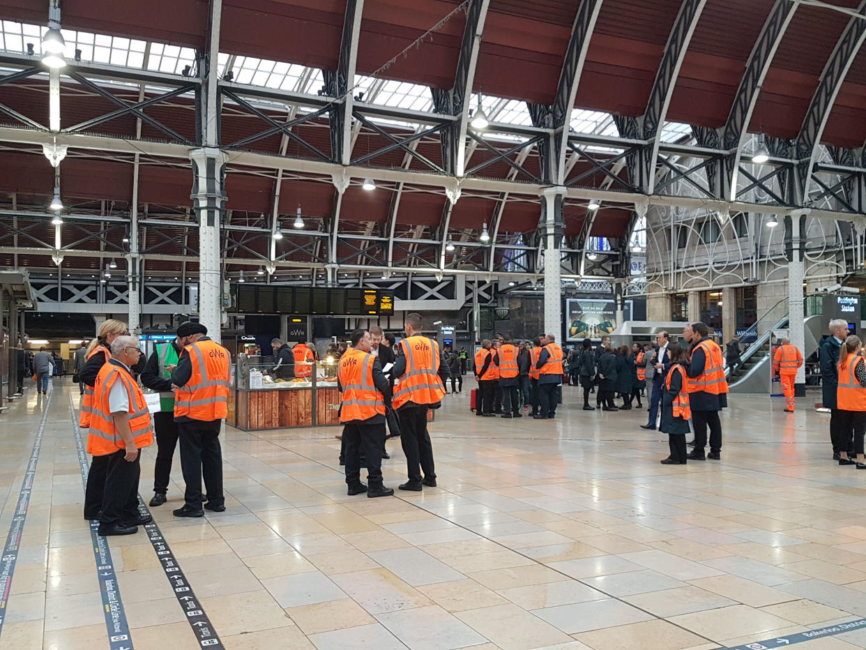 Engineers work at a quiet Paddington Station on Wednesday after the power line failure caused chaos. (PA)