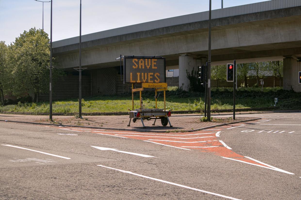 <span class="caption">Road signs often display safety messages in an attempt to reduce road crashes.</span> <span class="attribution"><span class="source">(Callum Blacoe/Unsplash)</span></span>