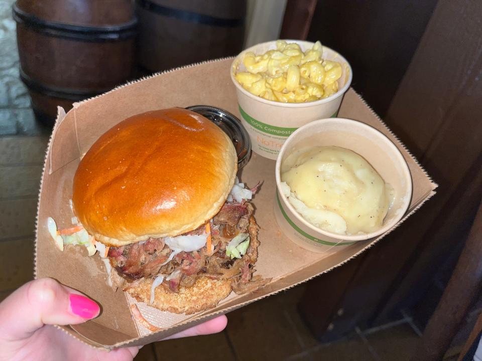 pulled pork sandwich in cardboard tray