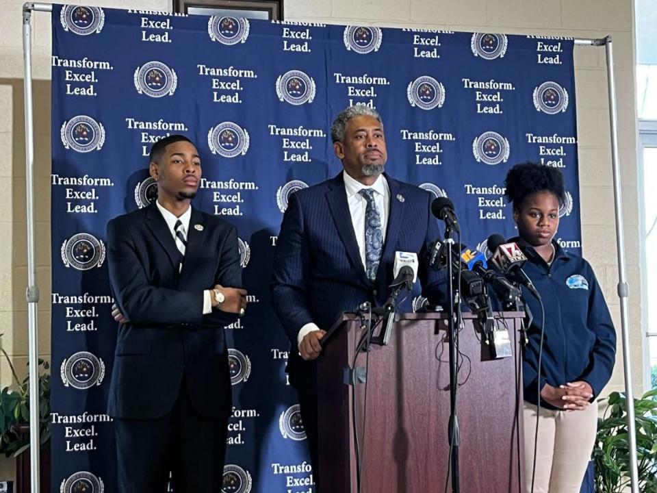 Marcus Burgess, interim president of St. Augustine’s University, speaks at a press conference about the university’s financial struggles Monday, Feb. 19, 2024. He is joined by student trustee Miles Beasley, to Burgess’ left, and student government president Arianna White, to his right.