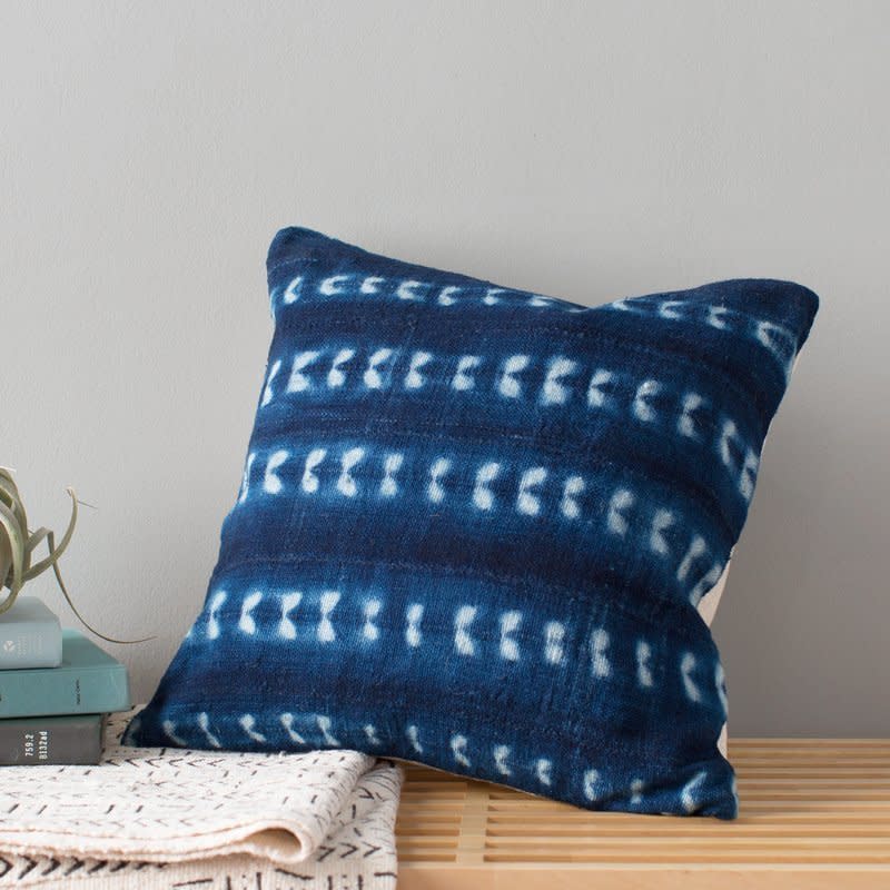 <a href="https://www.wayfair.com/One-Fine-Nest-Arrow-Print-African-Mud-Cloth-Pillow-Cover-OFNT1005.html" target="_blank">Shop it here</a>.&nbsp;